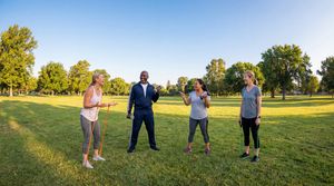 people-laughing-exercising-at-park