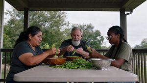 three-people-at-table-sorting-vegetables.jpg